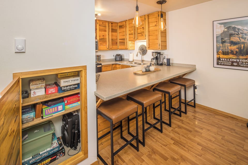 Bar seating for four to enjoy a quick snack | Main Level