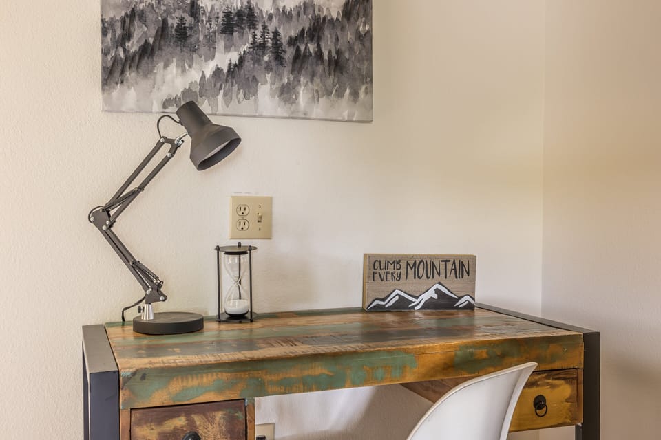 Desk and chair in upstairs hallway | Upper Level