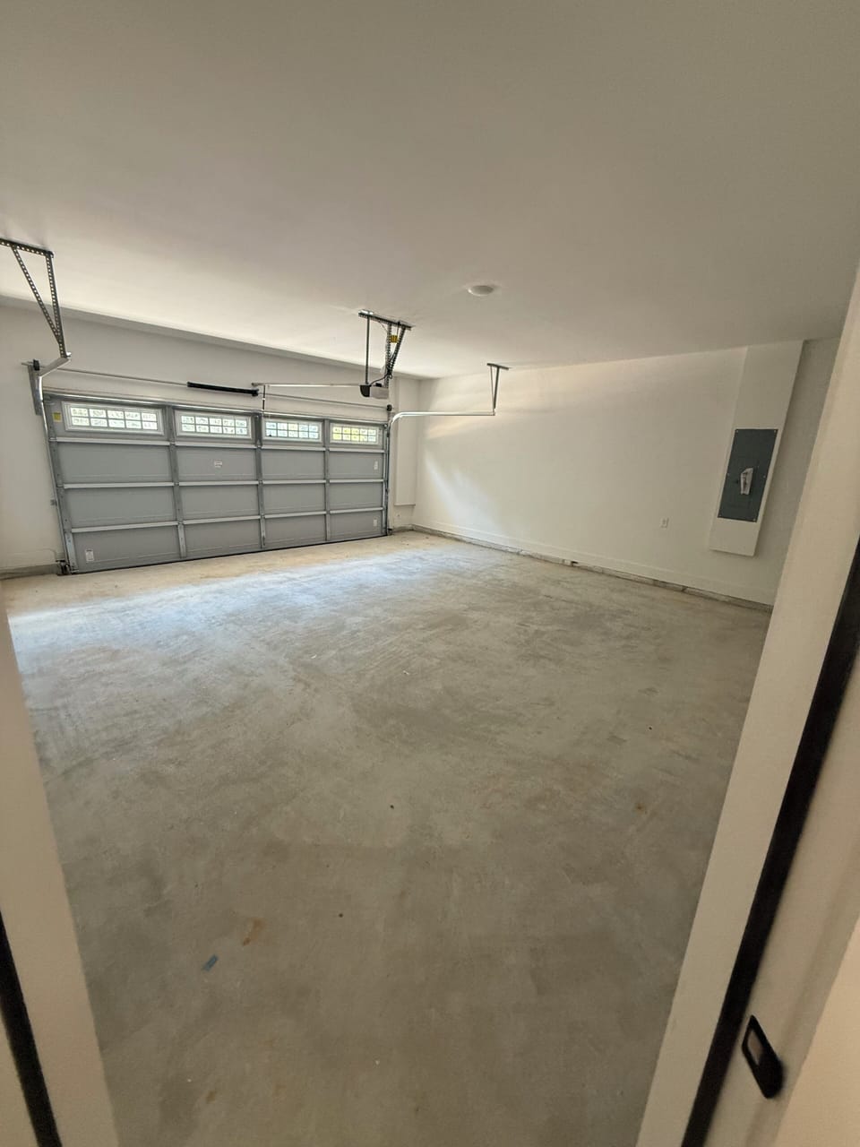 2 car garage- that now has tesla charging station. 