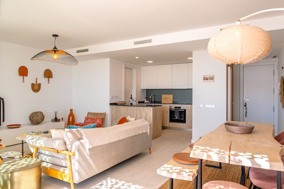 Inside living area with kitchen and dining area