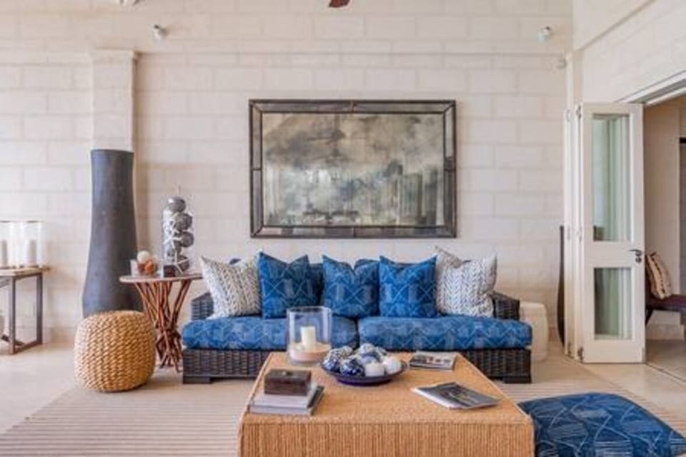 A perfectly designed outside lounge area within the verandah space, with beautiful furnishings and a stunning view, this area is perfect to relax within.