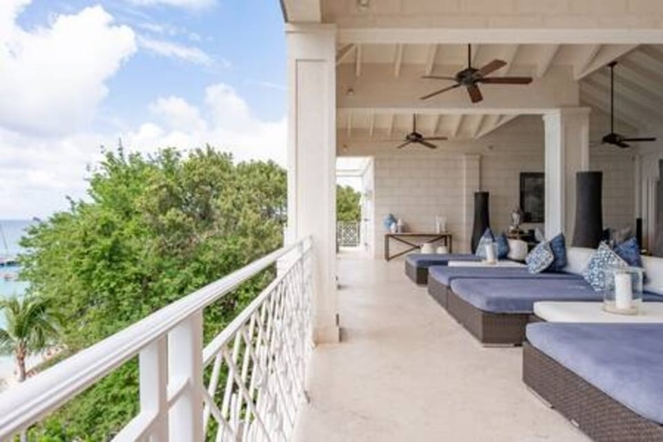 A perfectly designed outside lounge area within the verandah space, with beautiful furnishings and a stunning view, this area is perfect to relax within.