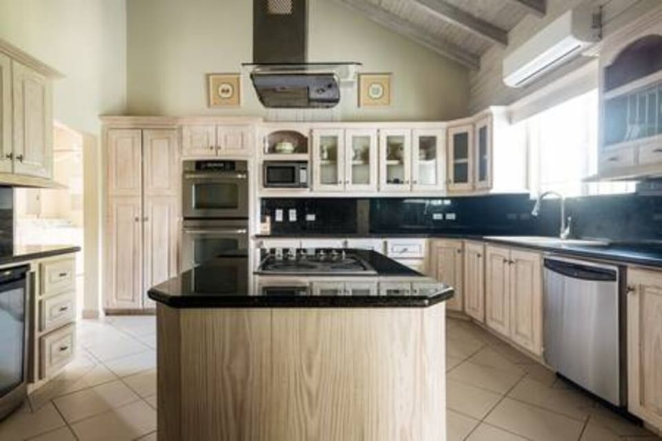 Fully equipped kitchen including a hob, oven, microwave, dishwasher and fridge freezer, Nespresso machine and blender.  This space is where the personal chef provides 3 consecutive meals from 7.30am to 9pm.