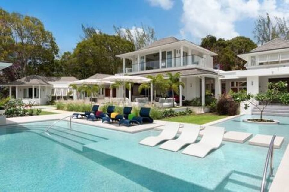 Beautiful salt water swimming pool with in pool seating and plenty of sun loungers.