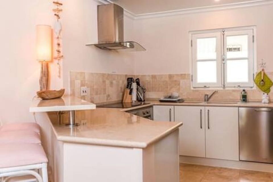 A well appointed, open plan kitchen ensure guests have everything they require to produce  a  relaxing meal at Boana.