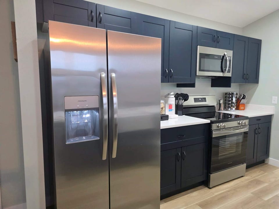 Our gourmet kitchen is fully stocked with high-quality cookware, modern appliances, and all the essential tools you'll need to prepare delicious family meals during your lakeside getaway.