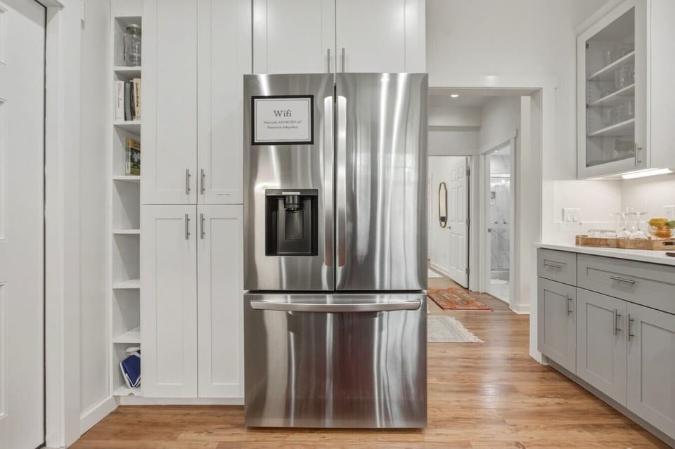 Kitchen | Stainless Steel Appliances | Built-in Storage & Window View