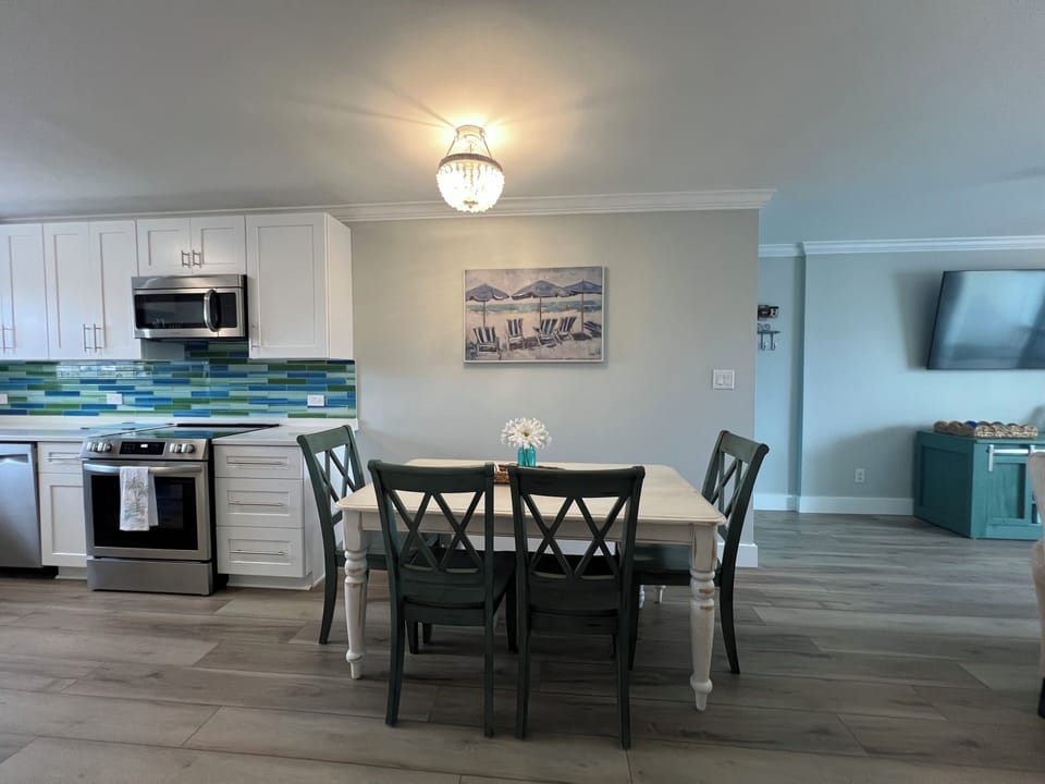 living area open to the dining and kitchen area