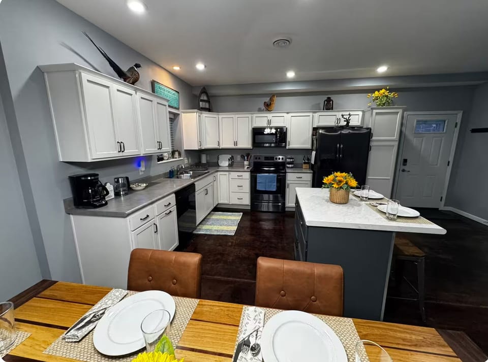 Spacious kitchen and dining area with plenty of room to cook and gather