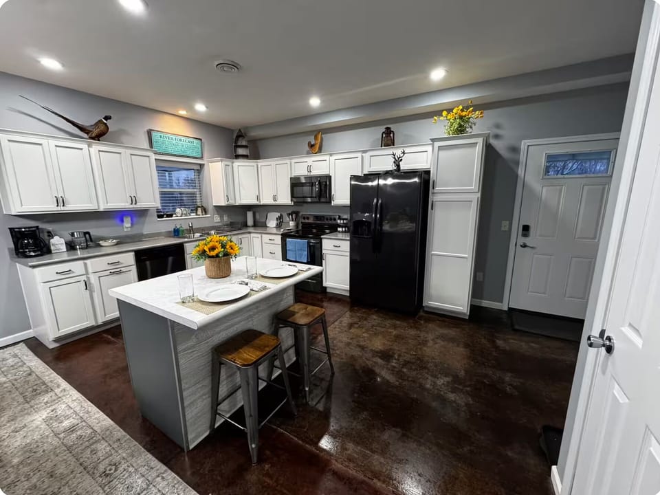 Fully equipped kitchen with full-size appliances, island seating and coffee bar