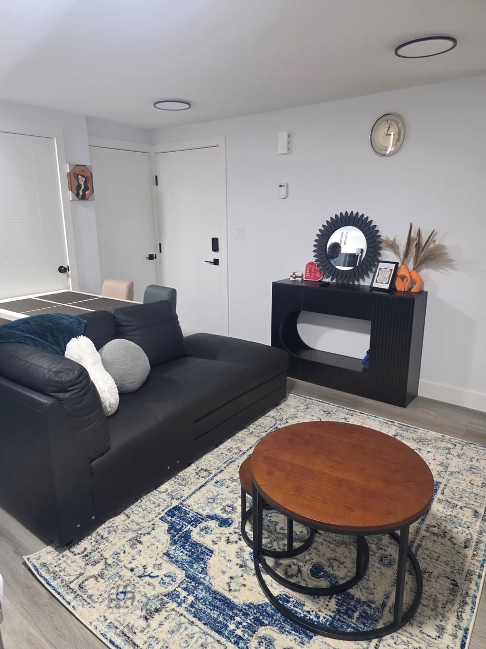 Modern centre rug, comfy 2 seater chair,nesting tables and console table!