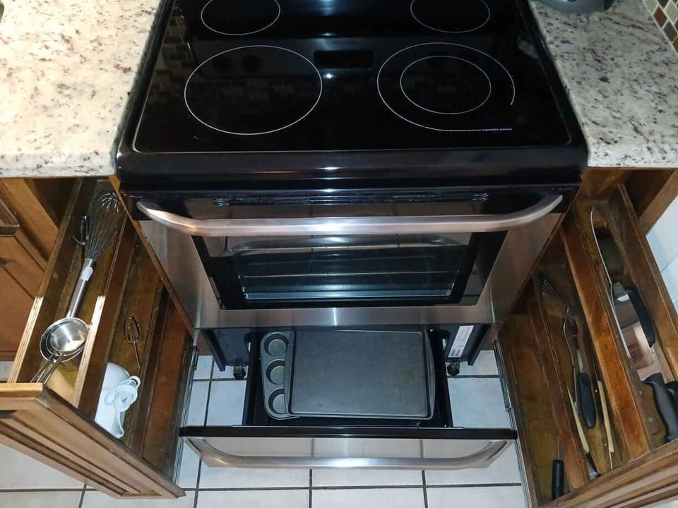 Inductive cooktop stove and regular oven.