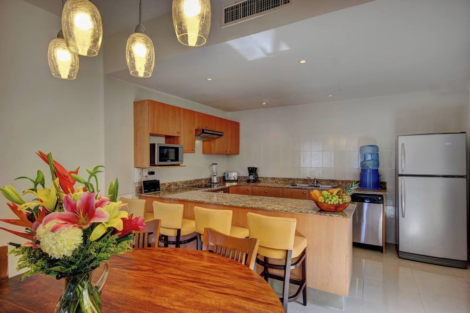 The kitchen is spacious and has all the necessary utensils for a comfortable stay.
