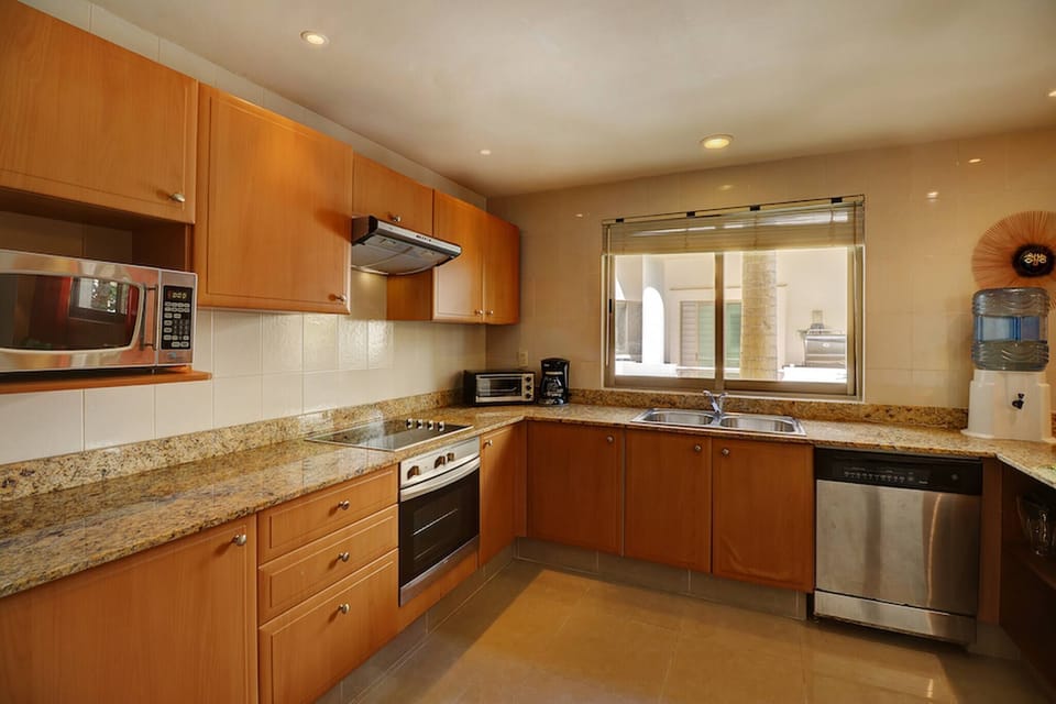 Kitchen with dishwasher and quality equipment