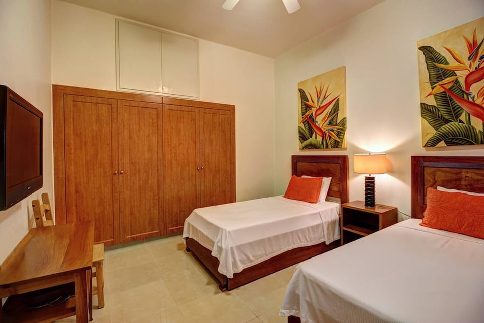 Second bedroom with TV/cable and full bathroom.