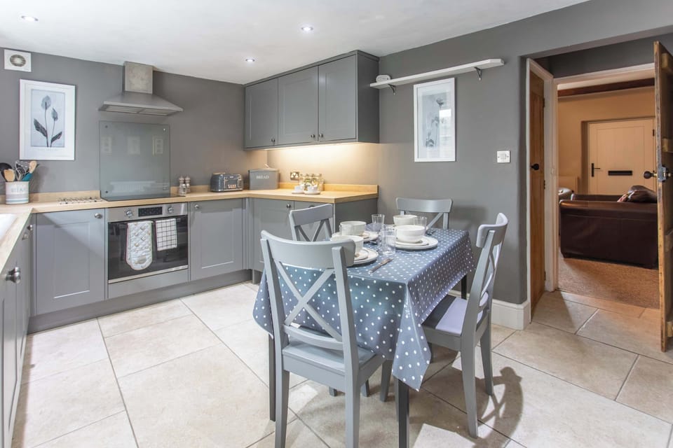 Start the day with fresh coffee and breakfast plans before heading out to explore the Dales, with a fully equipped kitchen ready for relaxed holiday living.