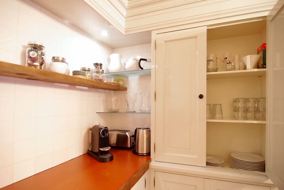 Fully equipped kitchenette (no stove present)
