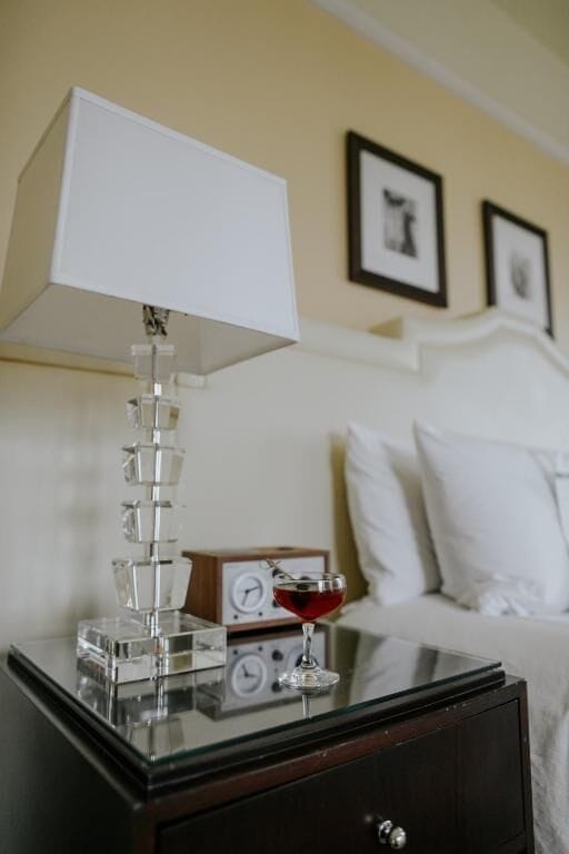 Toast the evening with a cozy, intimate bedside moment.
