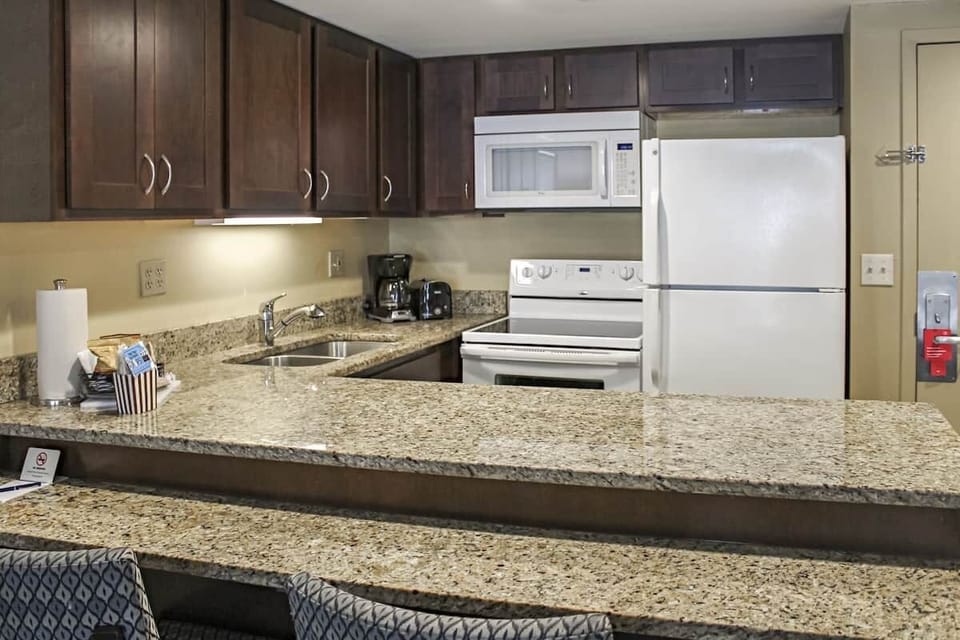 Serve easy breakfasts at the roomy bar counter and seating.