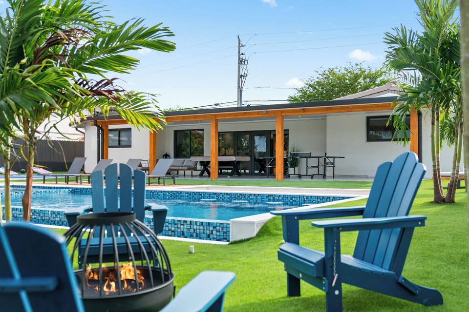 Relax by the fire pit with a beautiful pool view