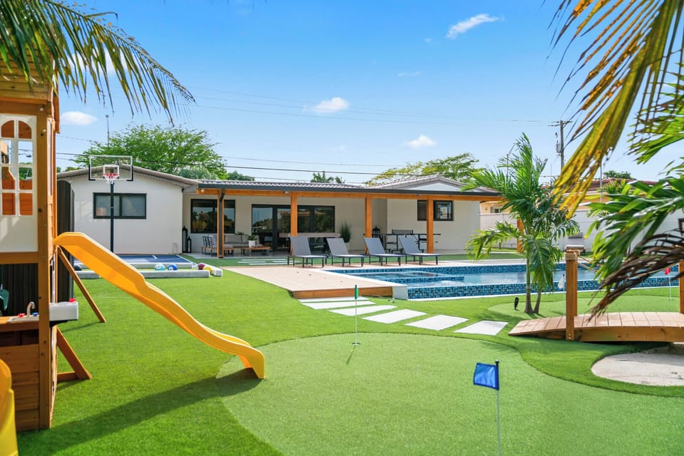 Pool view with a kid-friendly space for play and fun
