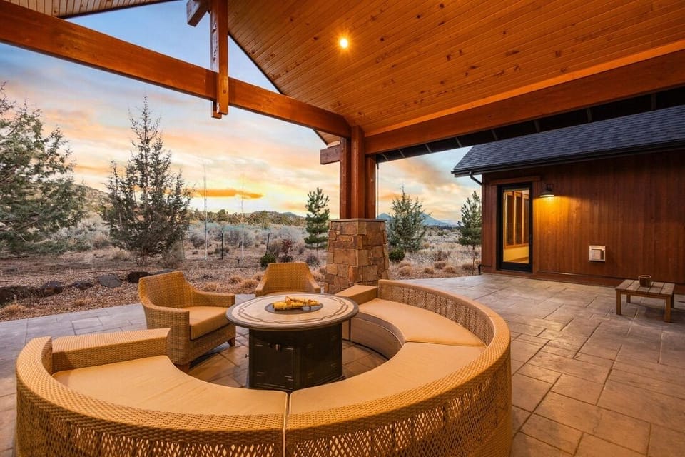 Covered patio with fire table and private hot tub retreat
