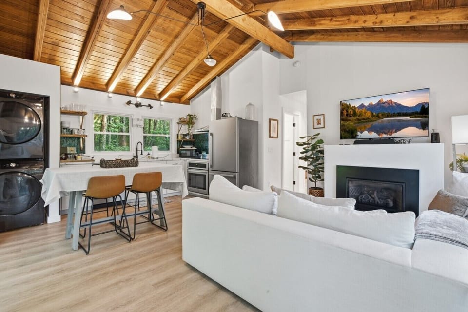 Living Room | Fireplace | Vaulted Wood Beam Ceilings & TV