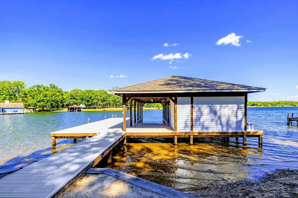 Boat Dock - The covered boat dock sits right at the edge of the cove, ready for the day on the water.