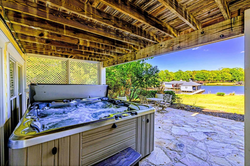 Hot Tub - Privacy-screened hot tub area, sheltered from the elements year-round.