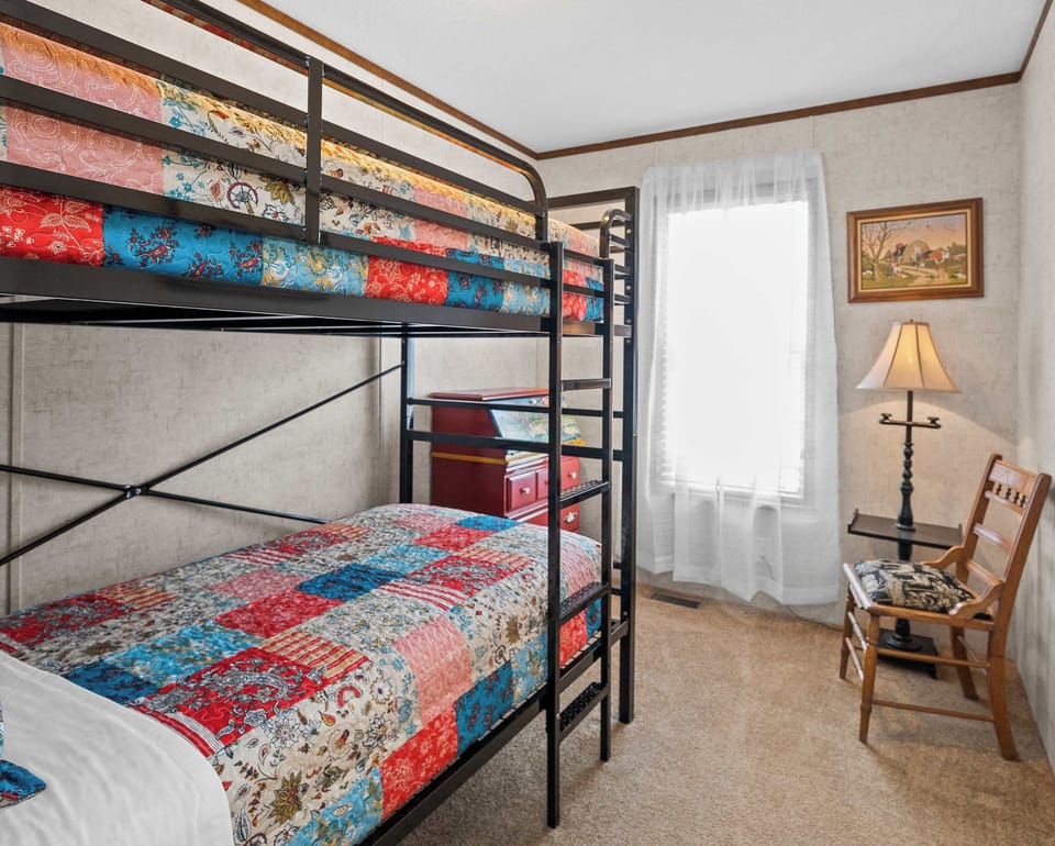 BUNK ROOM: Cozy bunk beds comfortably sleep 2; sports field view