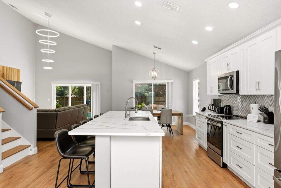 Open-concept living, dining & kitchen space designed for gathering together