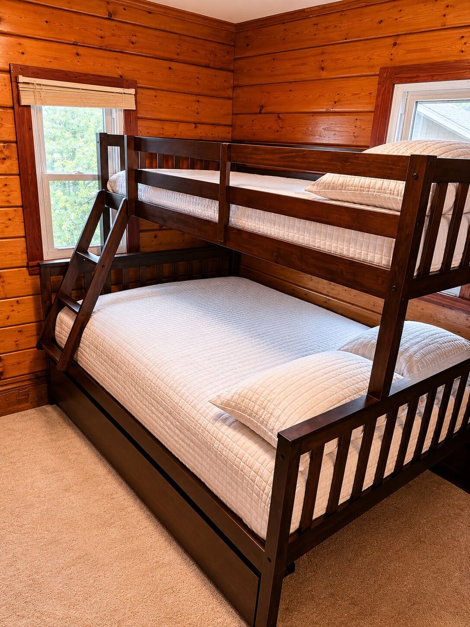 Bunk, single over double and trundle at bottom is a single