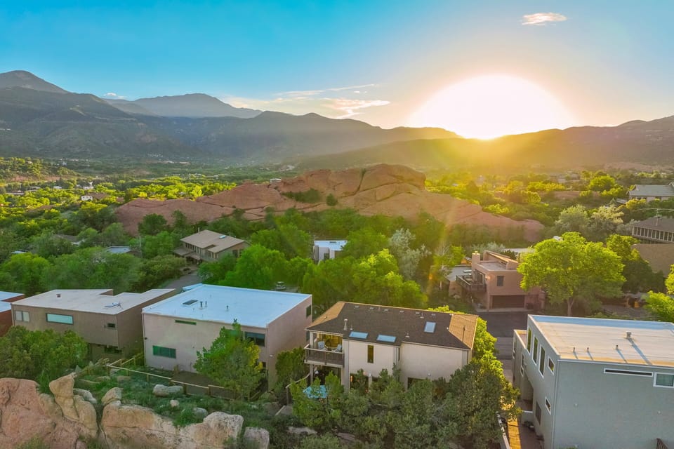 Custom multi-level Colorado Springs home set against stunning red rock scenery — located just one block from Garden of the Gods with incredible mountain views from nearly every level.