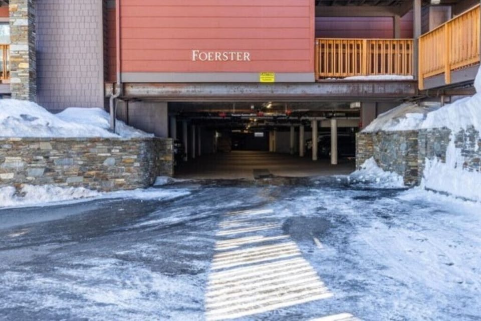 Our building and garage. 1 assigned parking space included. (7 ft clearance)
