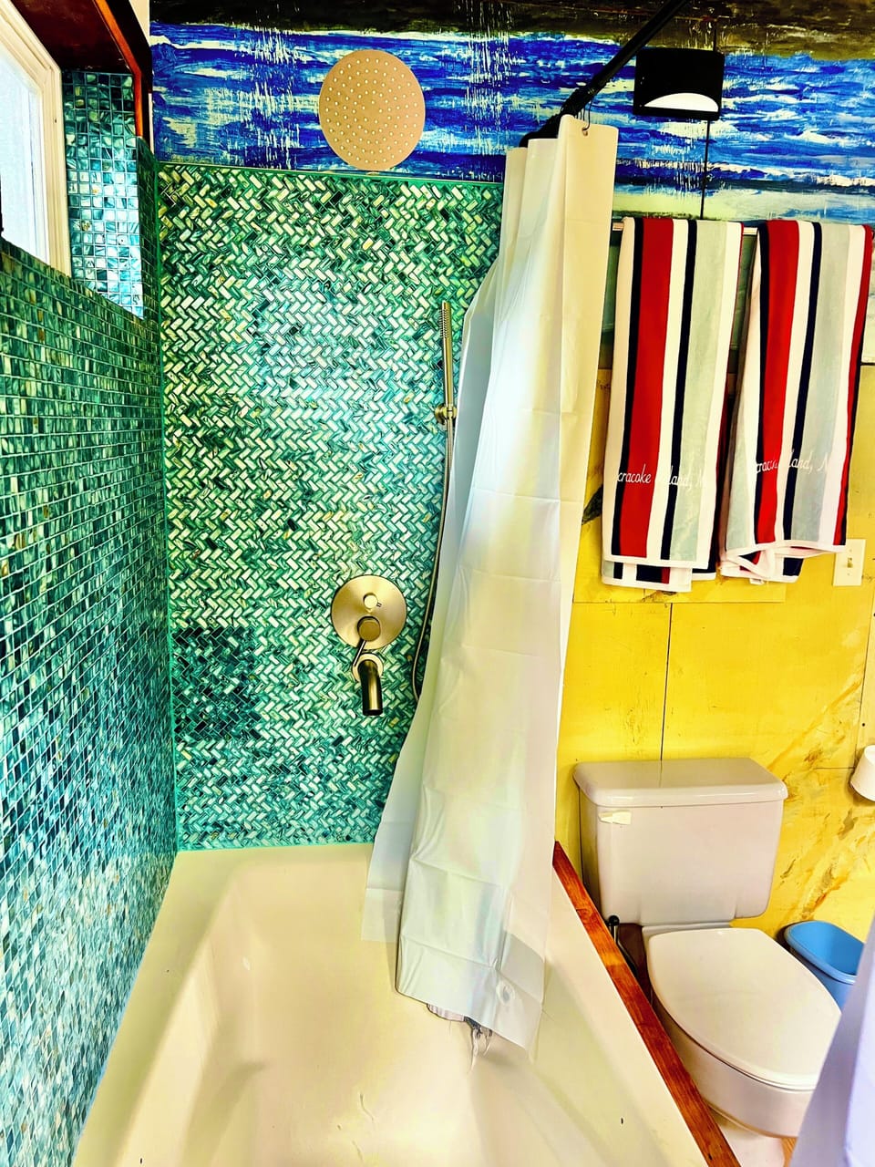 72” long by 36” wide deep dish soaking tub with sunflower rain showerhead
