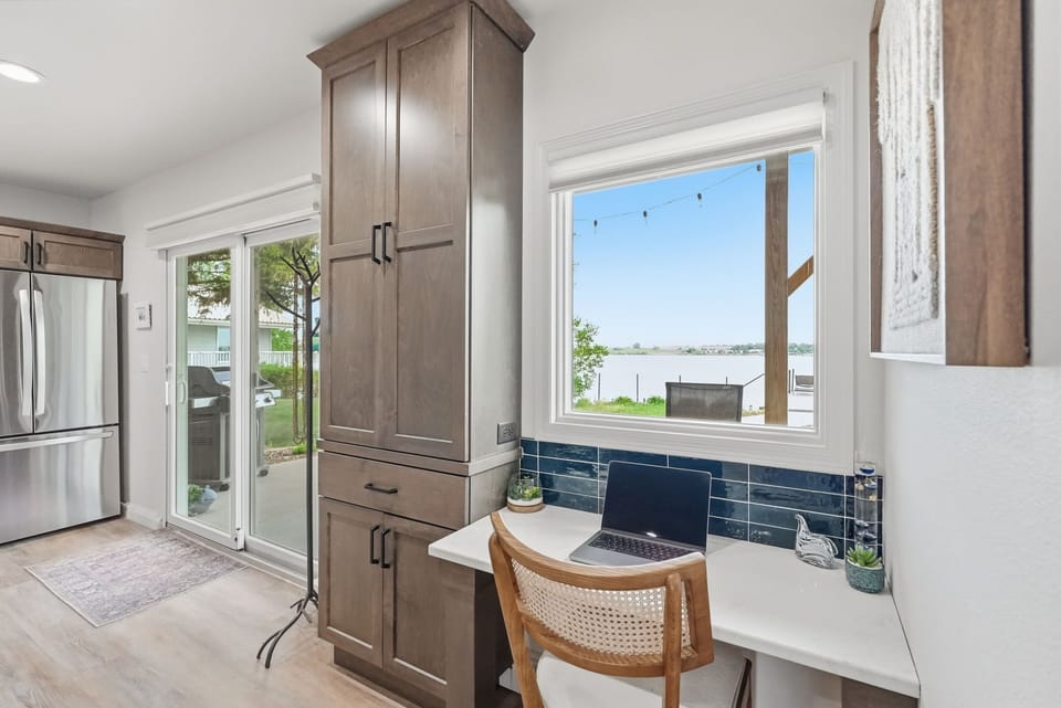 Lake view from the dedicated working desk w/ quartz countertop.