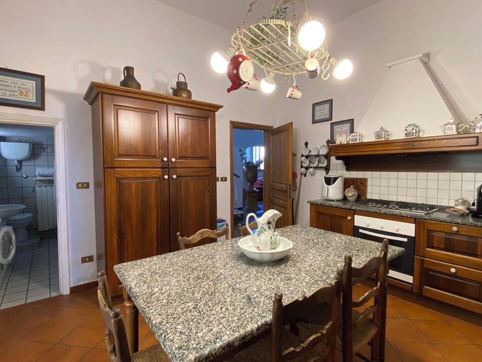 Kitchen, Interior Design, Wood, Furniture, Countertop, Cabinetry, Flooring, Lighting, Room, Ceiling