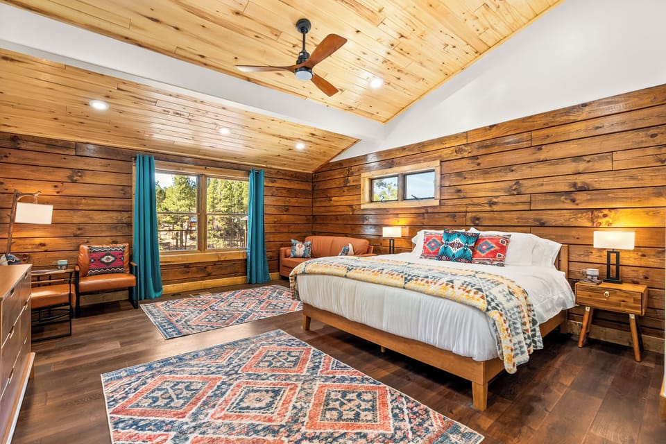 King Master Suite 1 of 2  King bed, queen sleeper sofa, and ensuite bath!