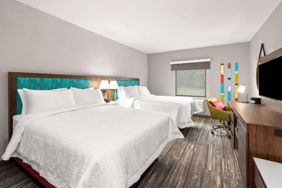 Stretch out with two inviting beds for effortless group stays.