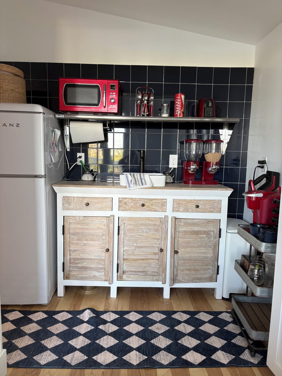 Between the master bedroom and the media room is a snack bar/coffee bar 