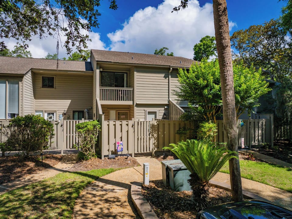 Front exterior of the property with private entry and parking access.