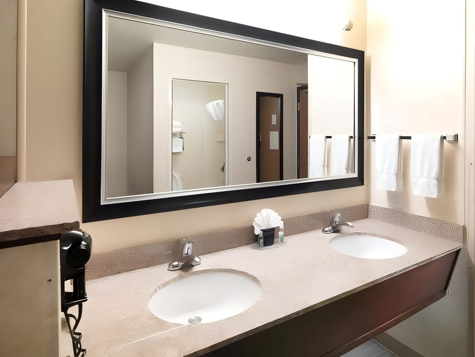 Get ready with extra counter space and bright mirror lighting.