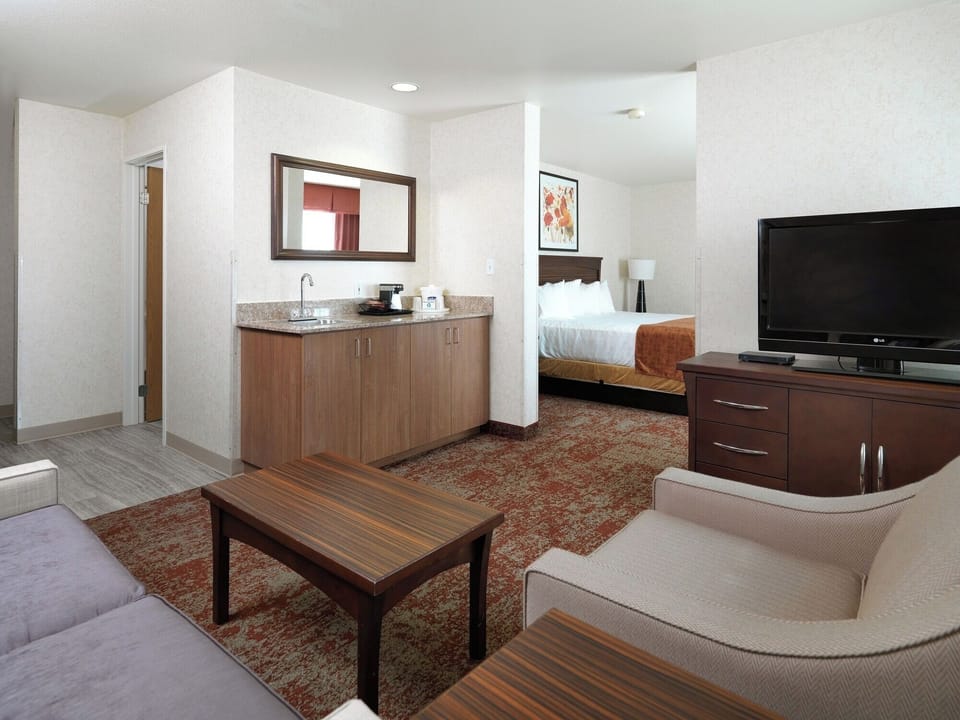 Gather in the open suite with convenient in-room refreshment bar.