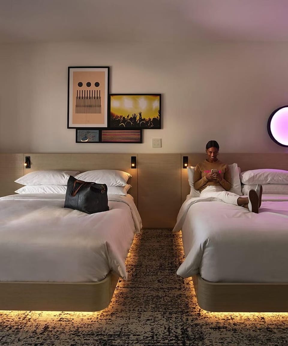 Spread out with two cozy beds and soft ambient glow.