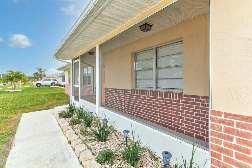 Front entrance with screened in porch