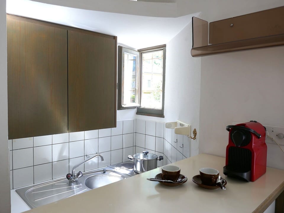 Countertop, Kitchen, Interior Design, Kitchen Sink, Kitchen Appliance, Plumbing Fixture, Sink, Tap, Flooring, Lighting