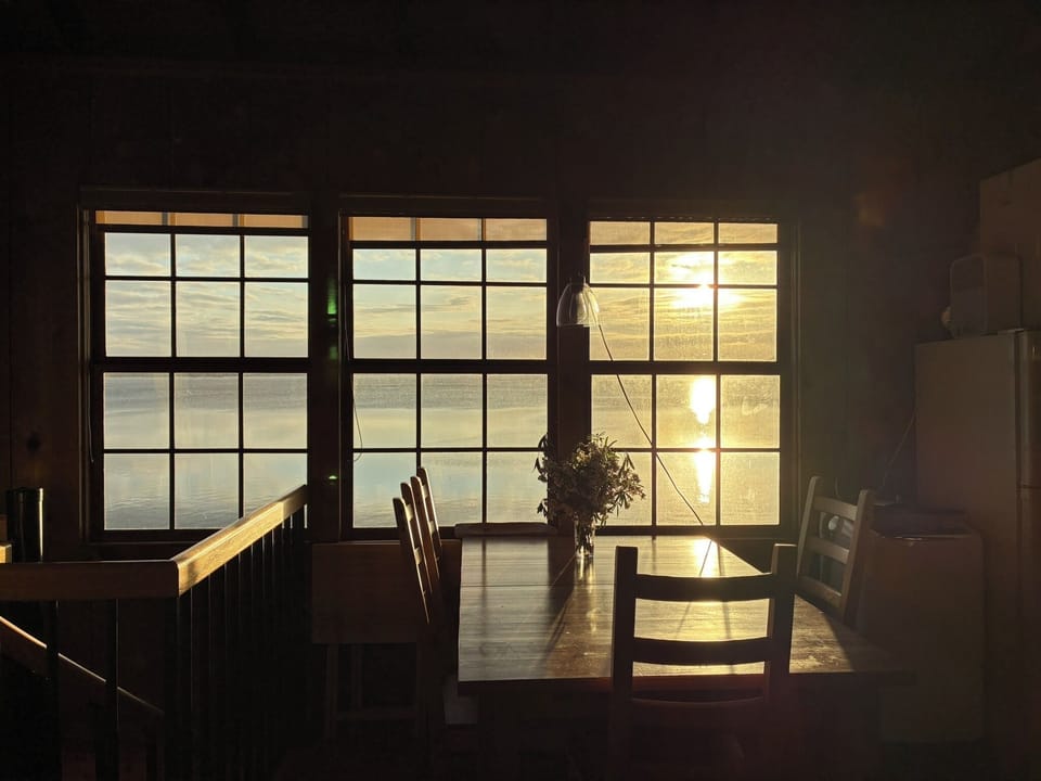 Sunrise view through dining room