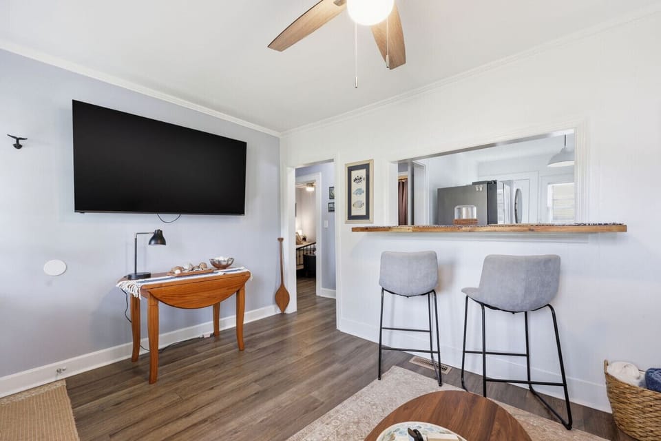 Relax with your favorite shows in this cozy and thoughtfully designed living area