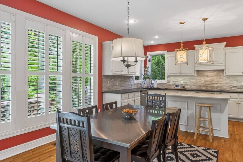 Additional dining table providing extra space for dining or entertaining.