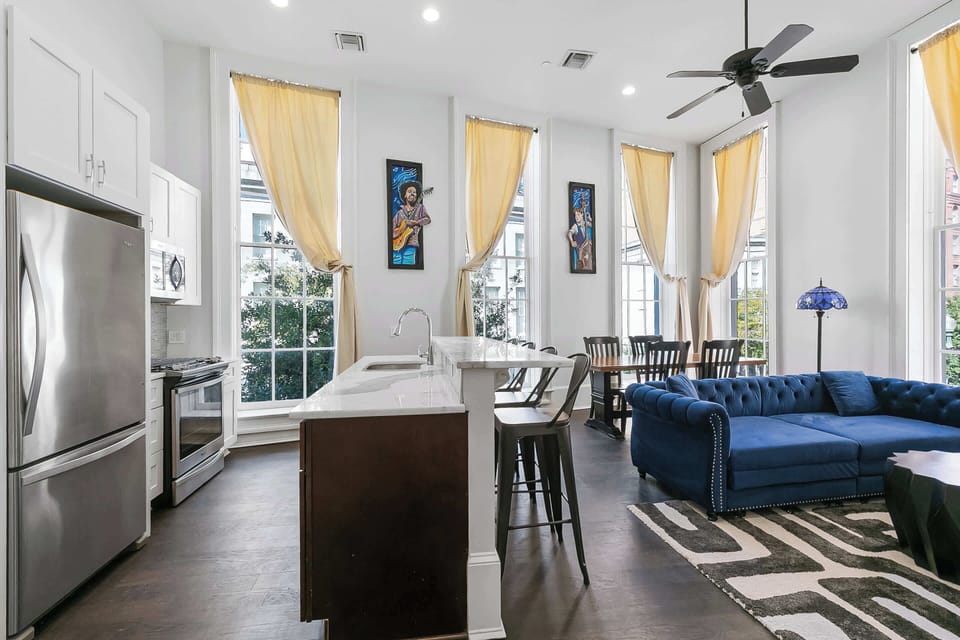 Fully equipped kitchen with a granite island and everything needed for a comfortable New Orleans stay.